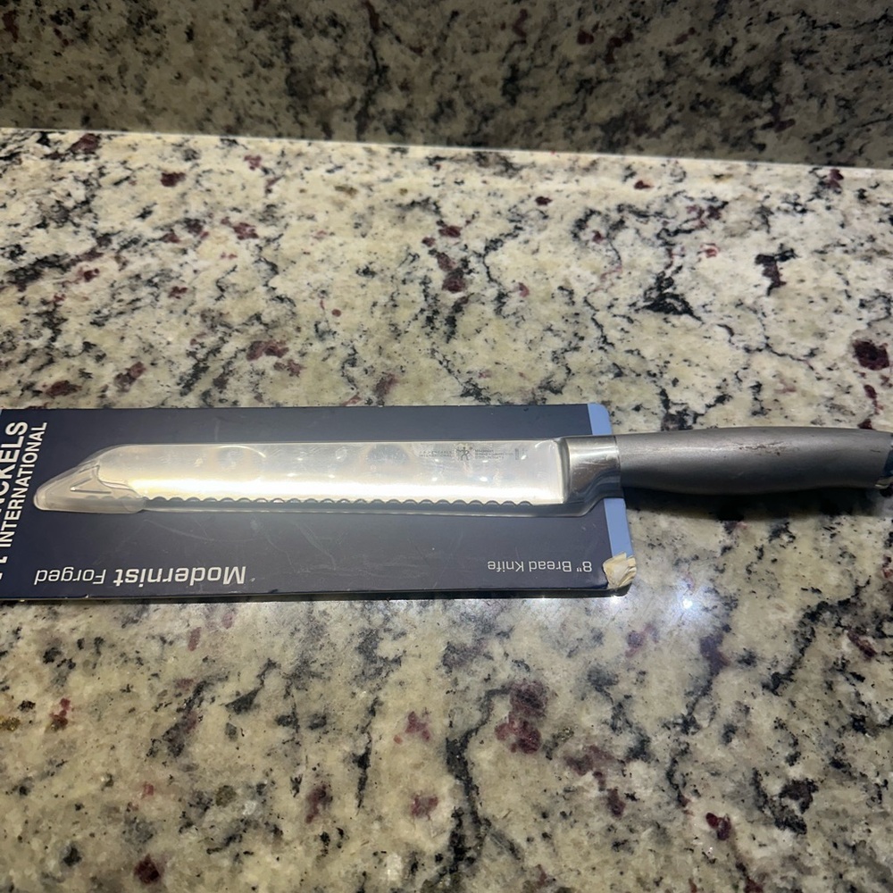 Mundial Serrated Bread Knife with Black Handle